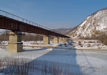 Winter landscape with railway bridgeの写真素材