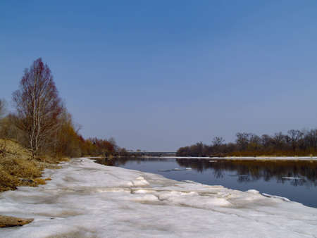 Spring landscape a last ice beside coast riverの写真素材
