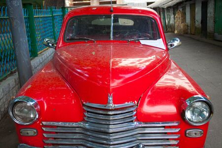 red russian retro car GAZ-M20 Pobeda (Victory) standing in the streetのeditorial素材