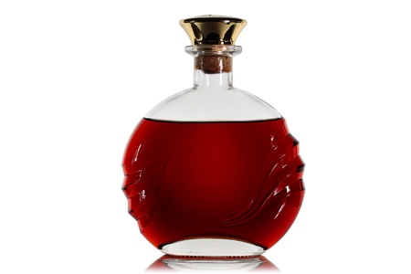 Bottle of brandy on a white background.の写真素材