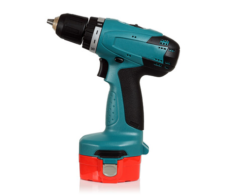 Cordless drill on a white background in the Studio.