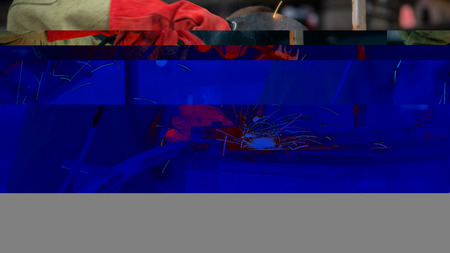 the execution of work welding work in the production room.の写真素材