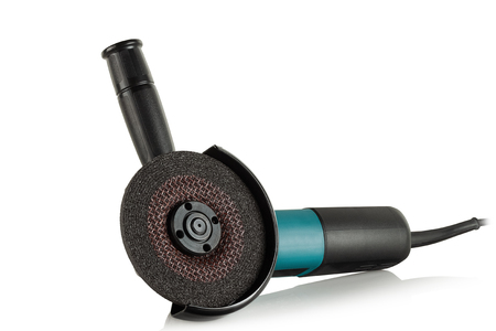 professional angle grinder designed to work with 125 mm diameter abrasive and diamond discs on white backgroundの写真素材