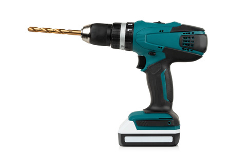 modern and powerful battery drill on a white backgroundの写真素材