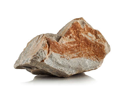 rough, broken stone on a white background close-upの写真素材