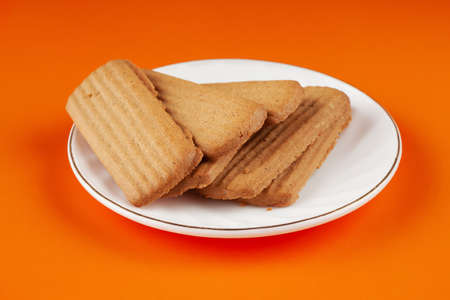 delicious delicious ginger cookies on a white saucer