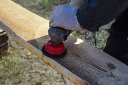 wood processing with an angle grinder and a metal brush