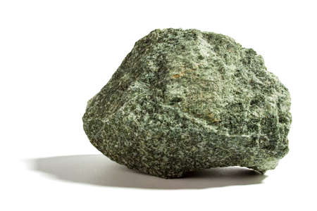 Stone, a fragment of jadeite on a white background