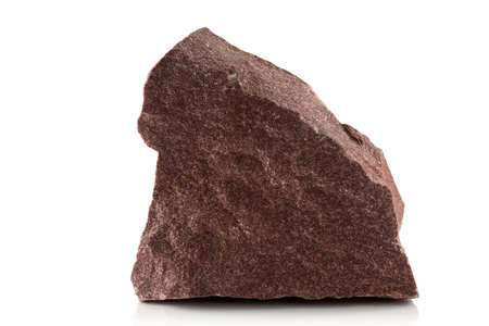 A stone, a rough fragment of crimson quartzite on a white backgroundの写真素材