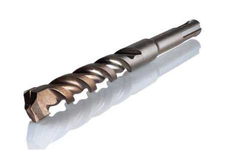 Drill, for drilling holes in stone, brick and concrete, on a white backgroundの写真素材