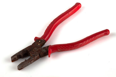 old rusty pliers on a white backgroundの写真素材