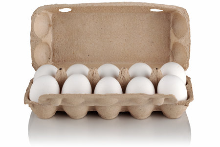 cardboard packaging for chicken eggs with eggs on a white backgroundの写真素材