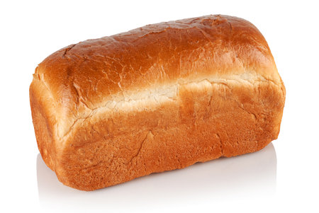 A loaf of freshly baked bread on a white background.の写真素材