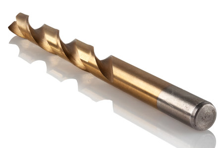 titanium nitride coated steel drill bit on white backgroundの写真素材
