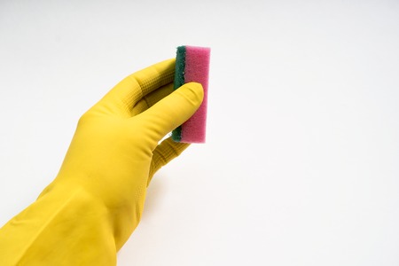 hands in yellow rubber gloves