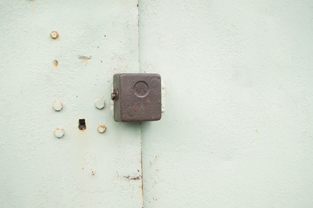 Old padlock on the old gateの写真素材