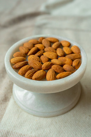 Close-up of almonds on a beautiful stand, Nuts are healthy.の写真素材