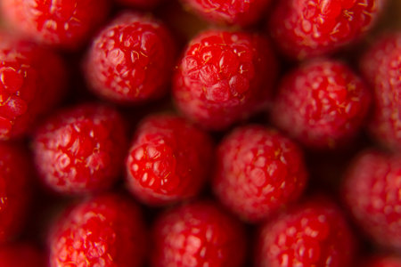 Raspberry close-up on a beautiful stand, summer fruit.の写真素材