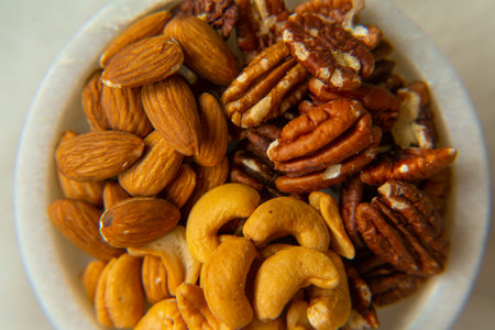 Mix Walnuts, pecan, almonds, cashews on a beautiful stand, Healthy Nuts.の写真素材