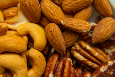 Mix Walnuts, pecan, almonds, cashews on a beautiful stand, Healthy Nuts.の写真素材
