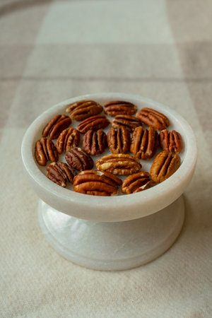 Walnut plan, pecan halves on a beautiful stand, Nuts are healthy.の写真素材