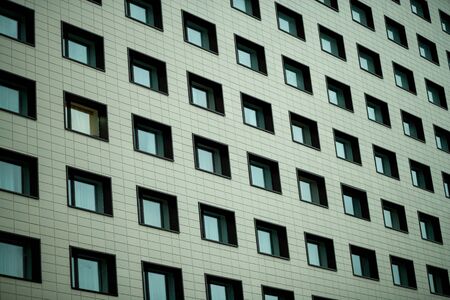 Facade of office building. Windows on the facade of a modern buildingの写真素材