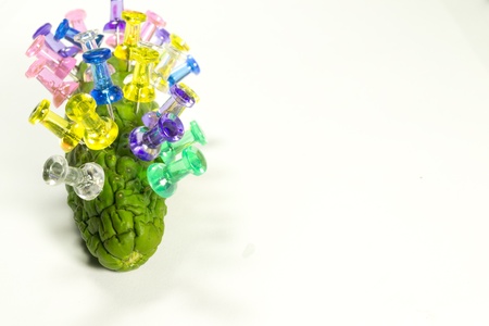 Cucumber with pins of different colorsの写真素材