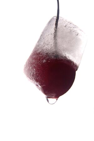 the frozen cherries on a white backgroundの写真素材