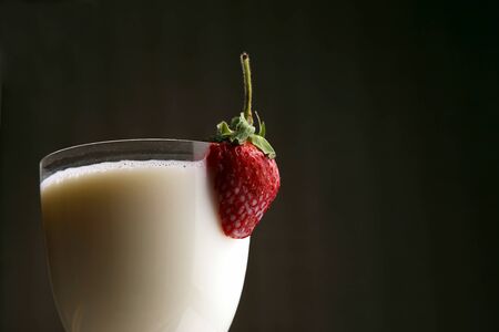 strawberry on the glass with milkの写真素材