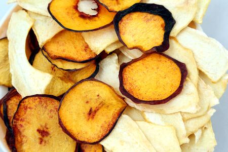 dried slices of sweet melon and peachの写真素材