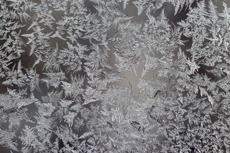 the unusual frost on a winter windowの写真素材
