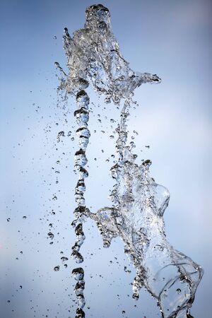 drops of the fountain in the skyの写真素材