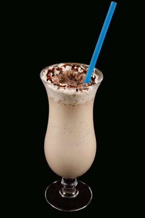 the milkshake with chocolate on a black backgroundの写真素材