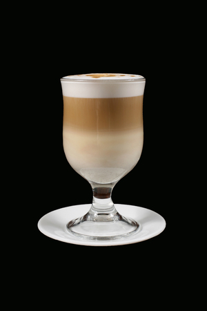the cappuccino in transparent glass on black backgroundの写真素材