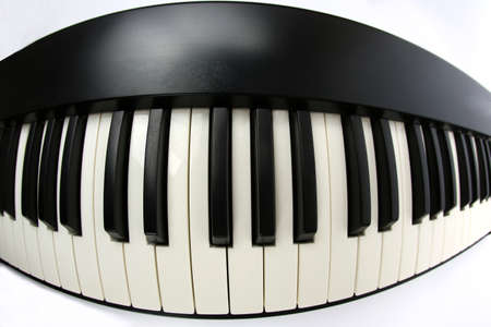 the piano keys closeup on white backgroundの写真素材