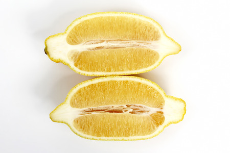 the cut along the two halves of lemonの写真素材