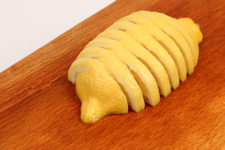the cut crosswise into slices a lemonの写真素材