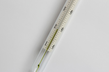 thermometer closeup on a light backgroundの写真素材