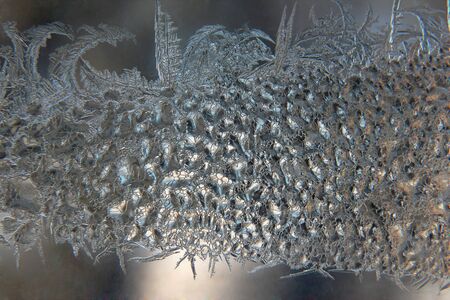 the unusual frost on a winter windowの写真素材