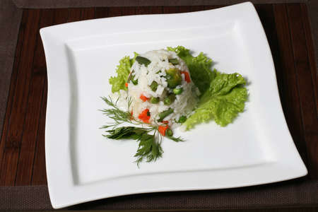 the salad of white rice, asparagus, peas, peppers and greensの写真素材