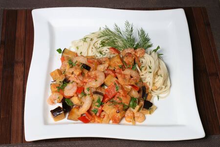 the spaghetti with shrimp, peppers and eggplantの写真素材