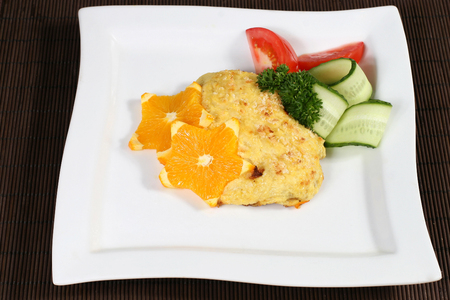 the baked meat with vegetables and orangeの写真素材