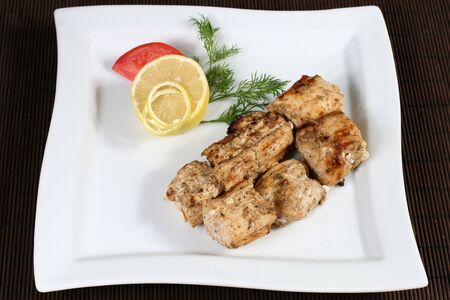 the grilled succulent meat with vegetablesの写真素材