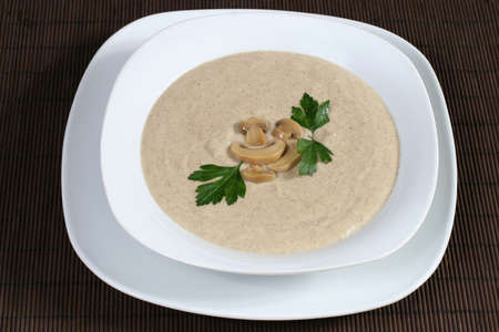 hot mushroom soup with herbsの写真素材