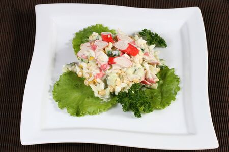 vegetable salad with crab sticksの写真素材