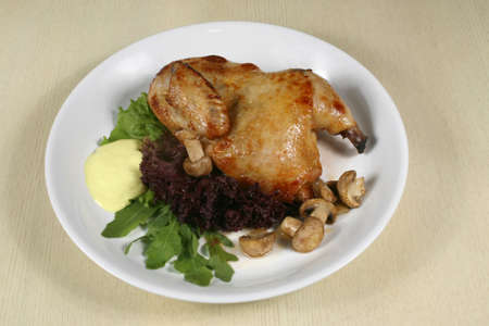 baked chicken with mushrooms and herbsの写真素材