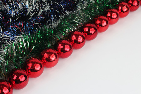 Christmas decorations made from jewelry and toys on a white backgroundの写真素材