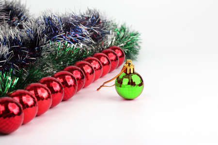 Christmas decorations made from jewelry and toys on a white backgroundの写真素材