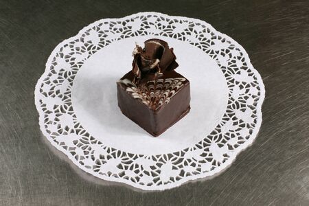 sweet chocolate cake on a gray backgroundの写真素材