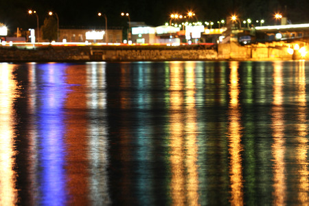 reflection of night city lights in the riverの写真素材
